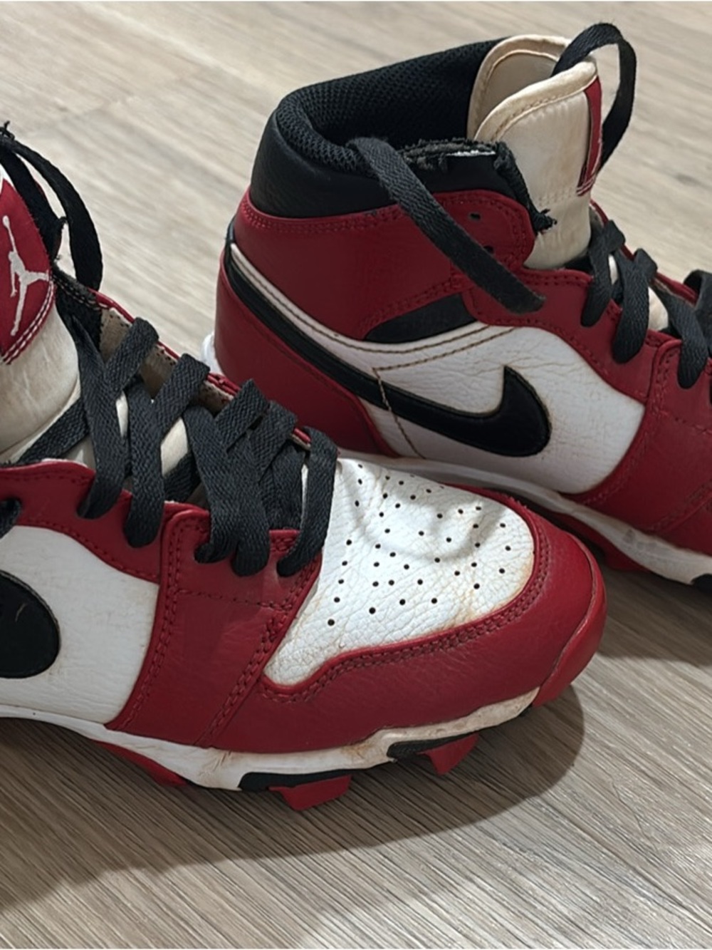 Kids Red and White High-Top Cleats with Black Accents